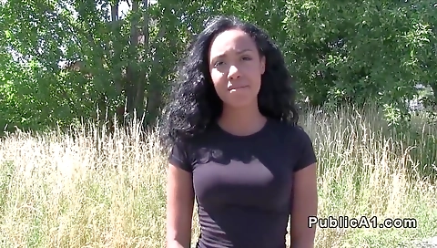 Ebony babe with large natural tits and tattooed body