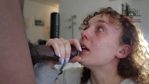 Brunette has a big cock in her mouth and deepthroat