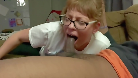 Young red-haired girl sucking and getting a big dick