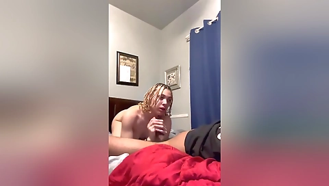 Blonde amateur with small tits is eating a huge cock