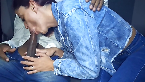 Amateur brunette redhead girl is on the passenger seat