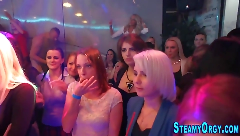 Blonde redhead with a shaved pussy is blowing a dick