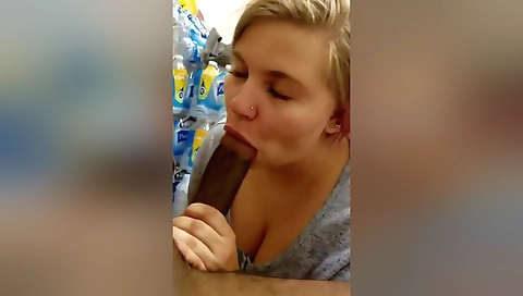 Blonde gets her big cock pounded by a guy in the store room