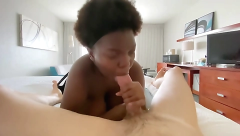 Ebony teen with huge natural tits deepthroats a hard cock