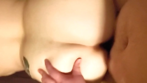 Brunette with a huge ass and natural tits riding cock