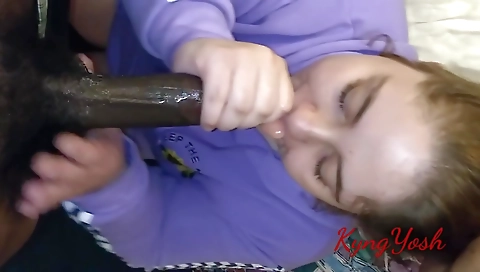 A teen with big ass sucks a large cock in her mouth